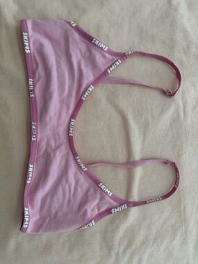 pink skims bra